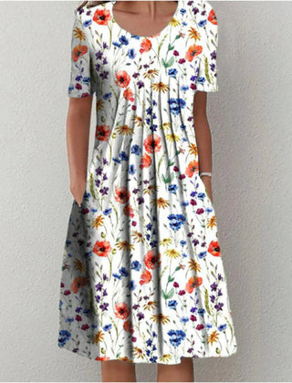 Gigi™ coverage dress, white base with red yellow and blue floral print, short sleeves