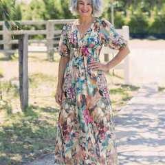 Floral V-neck midi dress with gathered waist and full flowing skirt