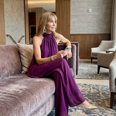 Purple halter-neck tunic set with flowing layered drape and wide-leg pants