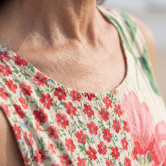 Floral midi dress close-up, scoop neckline and gathered bodice, multicolor floral print