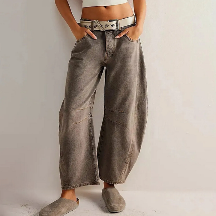 Charcoal wide-leg jeans with belt loops, button closure, and front patch pockets.