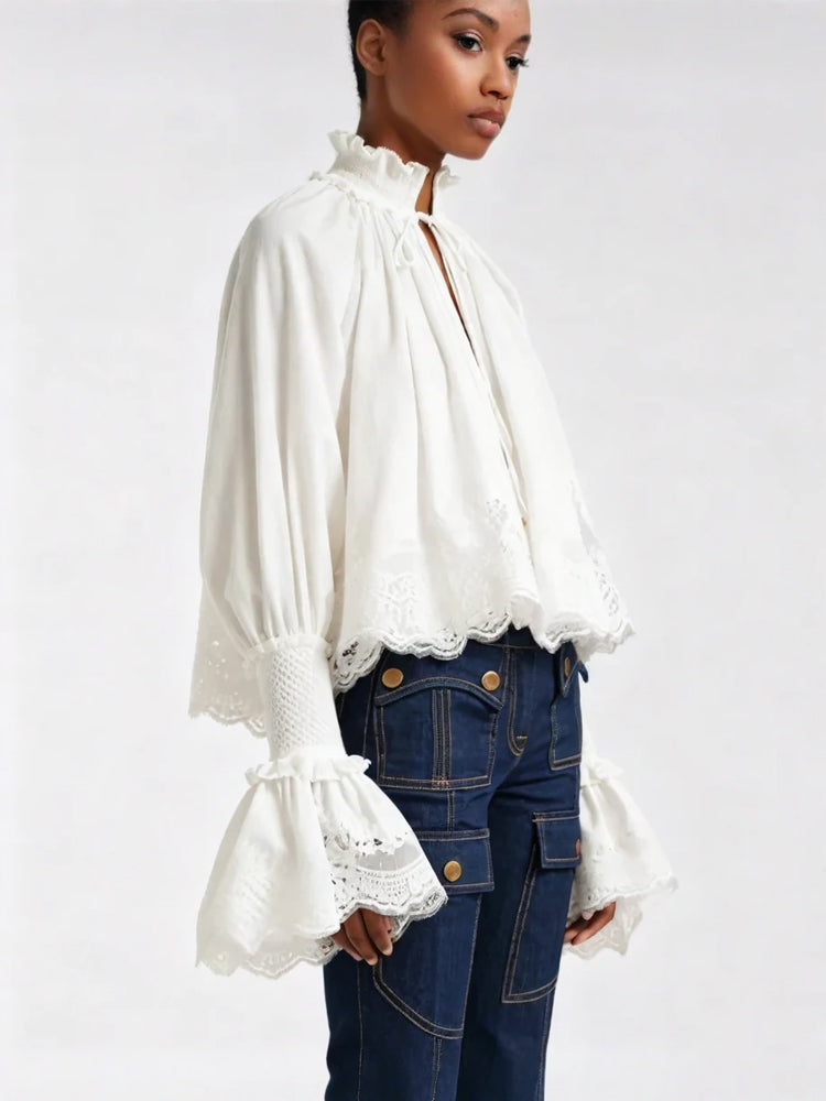 Vivienne blouse in white with lace-edged sleeves and scalloped hem detail