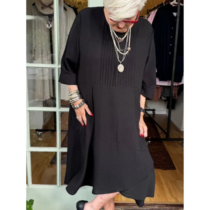 Black pleated irregular-hem midi dress with three-quarter sleeves and scoop neckline