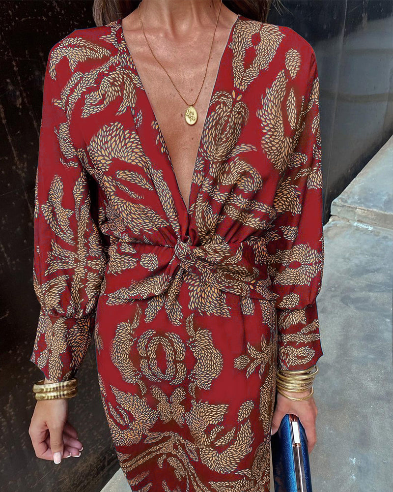 Red patterned V-neck summer dress with knotted waist and long sleeves