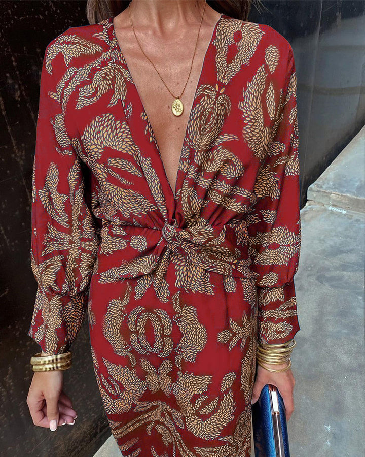 Red patterned V-neck summer dress with knotted waist and long sleeves