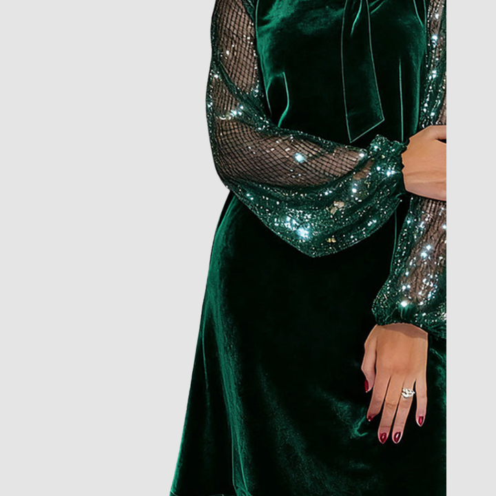 Green velvet midi dress with sequined mesh sleeve overlay and bow neckline