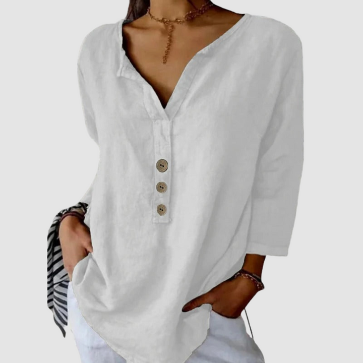White linen-cotton blouse with V-neck and three-button front, three-quarter sleeves