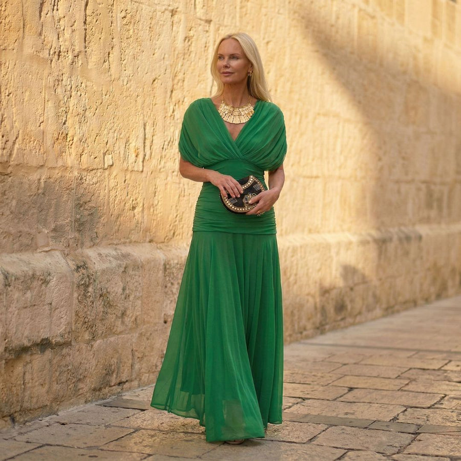 Elegant kelly green maxi dress with draped cowl neckline and gathered waist.