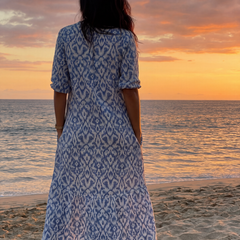 Blue patterned midi dress, back view with short sleeves