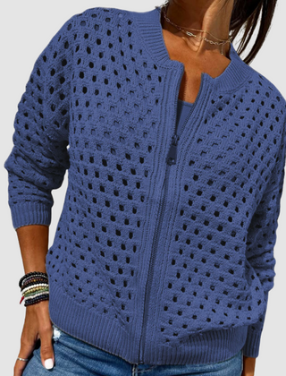 Blue knitted cardigan with full-zip front, perforated dot texture, ribbed cuffs and hem
