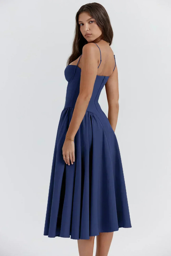 Blue corset sundress with sweetheart bodice and pleated midi skirt