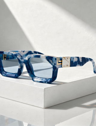 Monaco Marquee Shades sunglasses with blue marble square frames and gold logo detail
