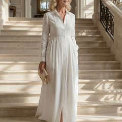 White soft flow maxi dress with V-neck, button front, long sleeves, pleated skirt
