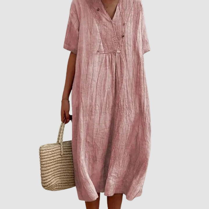 Pink bohemian dress with V-neck, short sleeves, gathered waist, airy midi