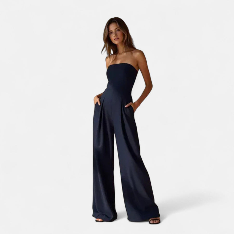 Navy strapless lightweight jumpsuit with wide legs and draped bodice