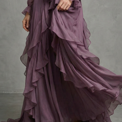 Purple tiered maxi skirt detail with layered ruffles and ruched cuffs
