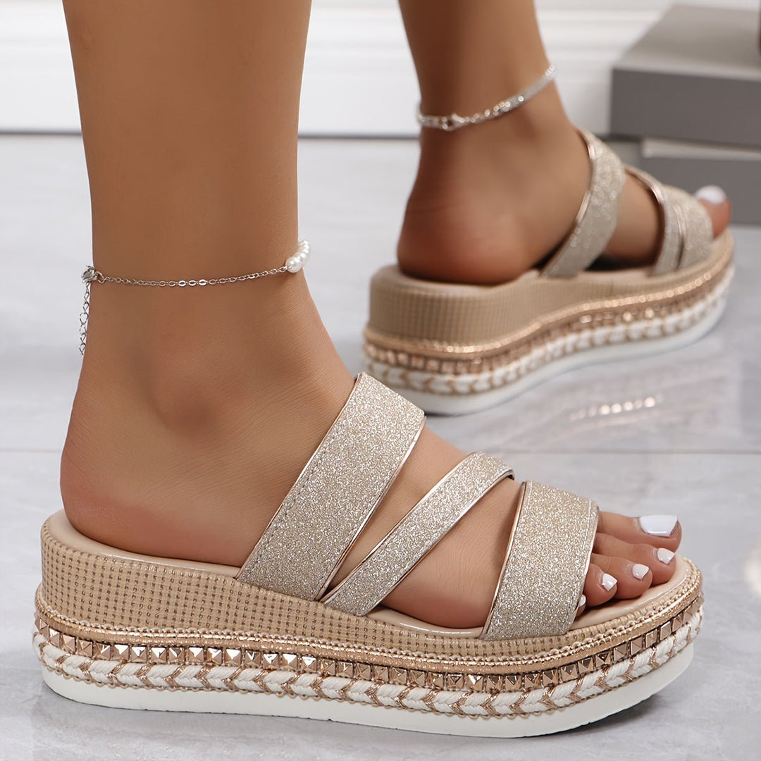Gold glitter platform sandals with ankle chain and three wide straps