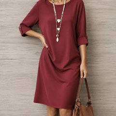 Wine red midi dress with round neckline and 3/4 sleeves, loose draped fit