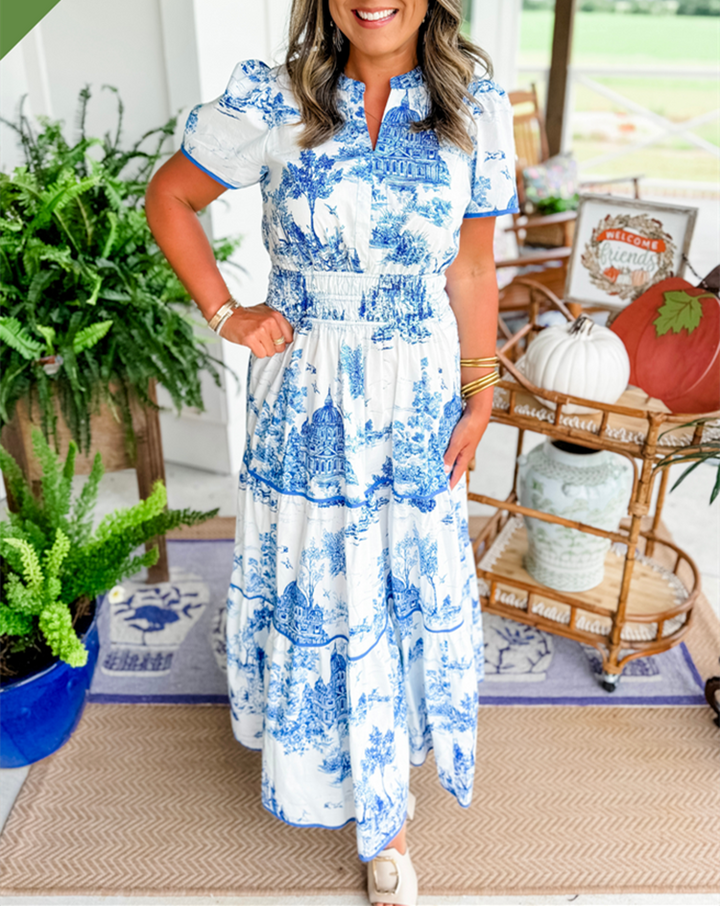 Tiered maxi dress with short sleeves and V-neck, white base with blue toile print