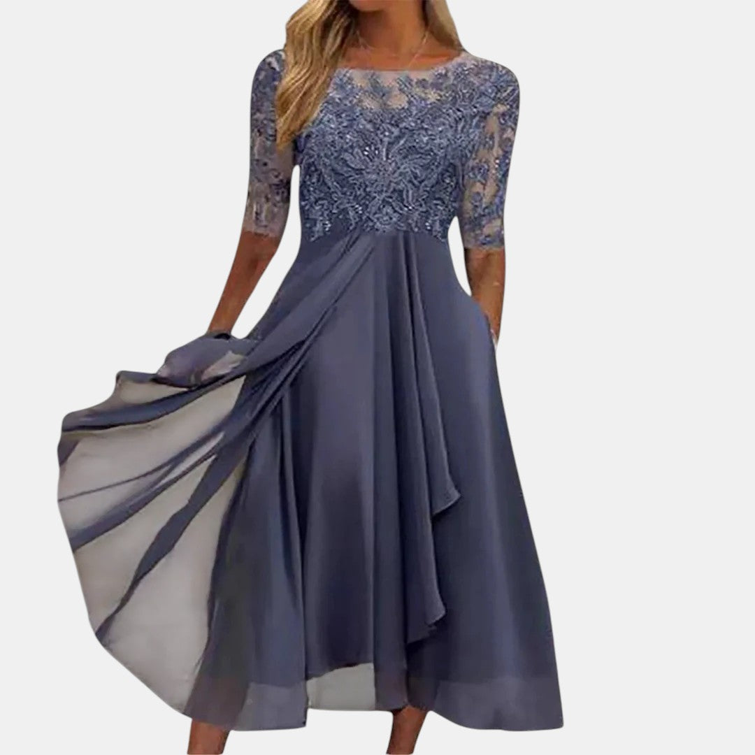 Blue elegant dress with lace bodice, 3/4 sleeves, and layered pleated skirt