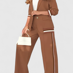 Brown lounge set with cropped jacket and wide-leg pants featuring contrast striped trim