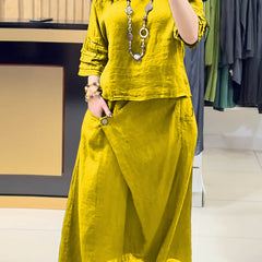 Yellow two-piece outfit: long-sleeve tunic and gathered midi skirt with pockets