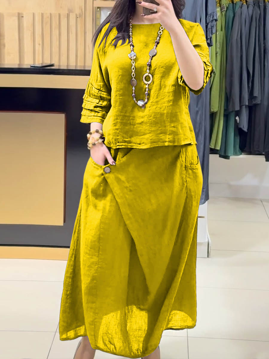 Yellow two-piece outfit: long-sleeve tunic and gathered midi skirt with pockets