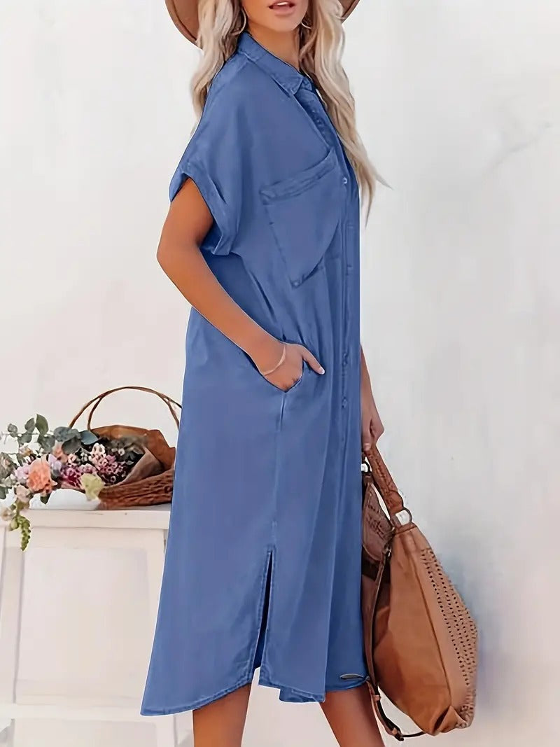 Blue shirt dress detail: collar, button-front, and two flap chest pockets