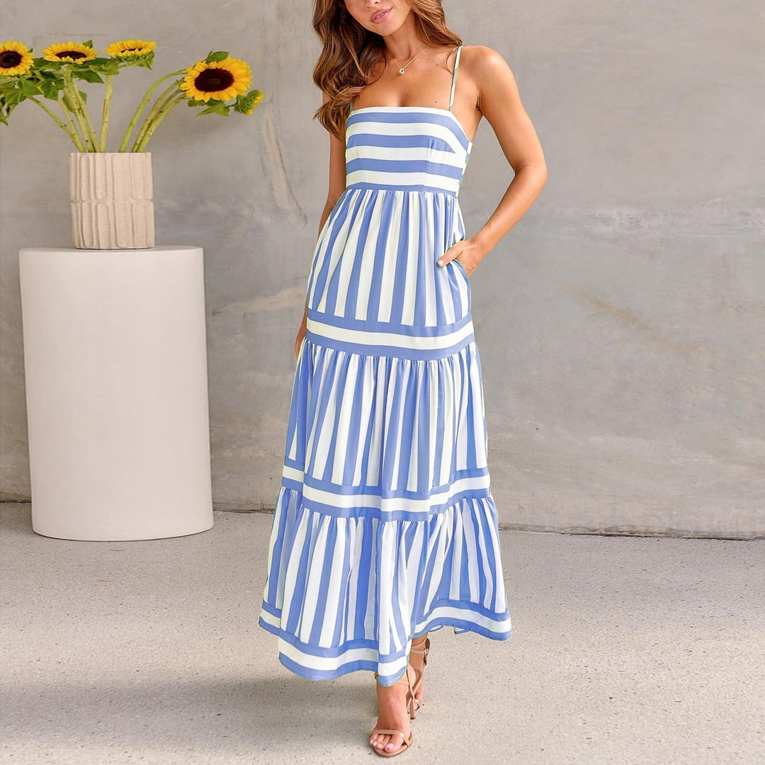 Blue and white striped maxi dress with tiered ruffle layers and spaghetti straps