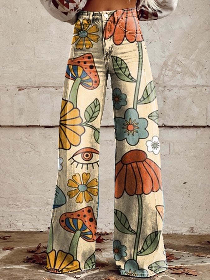Boho vintage wide-leg jeans in off-white with colorful floral and animal print