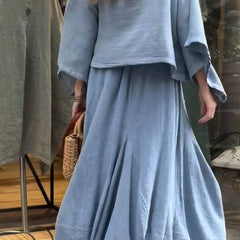 Sabrina set in light blue: close-up of loose tunic and gathered maxi skirt with pockets