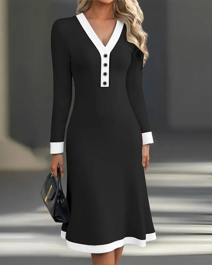 Black long-sleeve V-neck midi dress with white trim and button-front placket