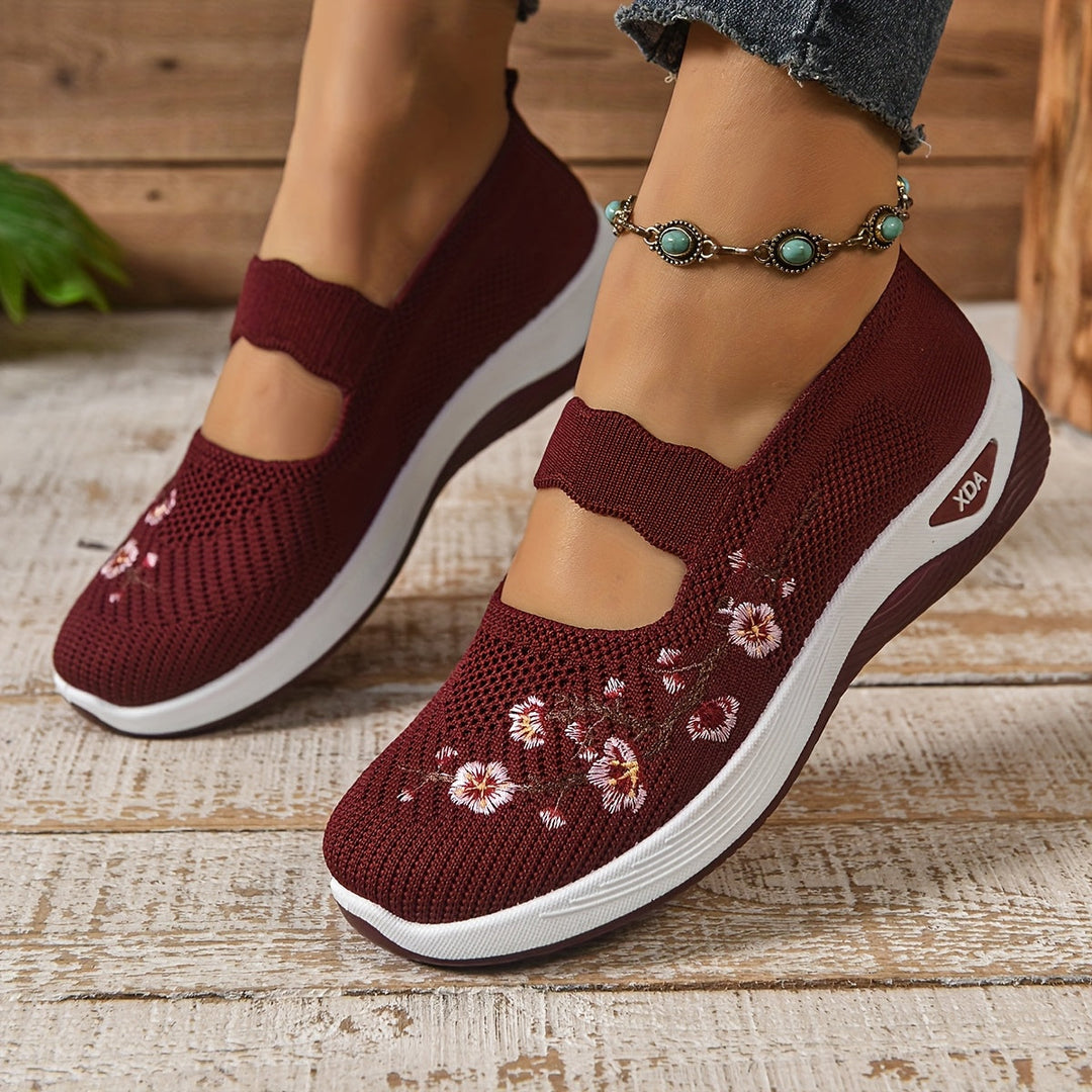 Red knit orthopedic comfort slip-on shoes with floral embroidery and cushioned sole