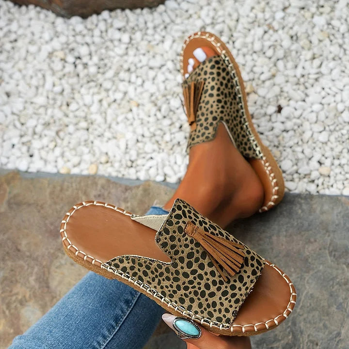 Casual orthopedic sandals with leopard-print fabric and tan braided slide sole