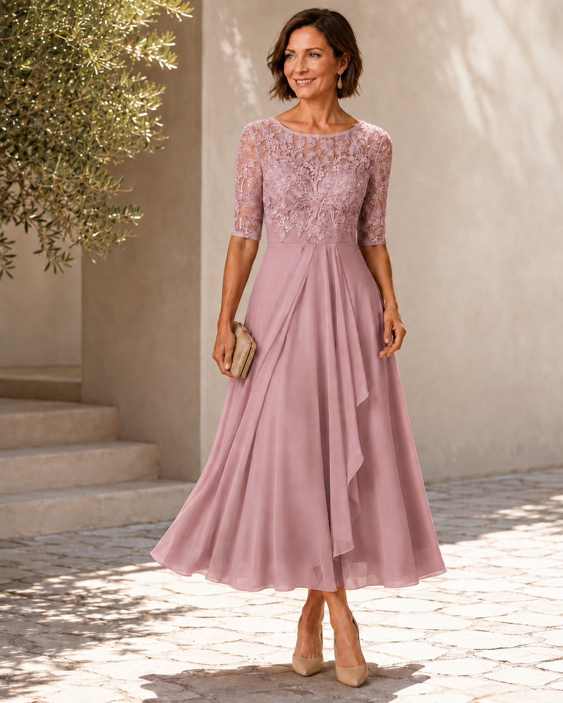 Pink lace midi dress with 3/4 sleeves, embroidered bodice and flowing layered skirt
