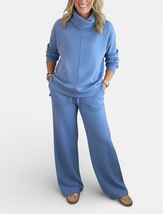 Light blue two-piece lounge set with hooded pullover and wide-leg pants