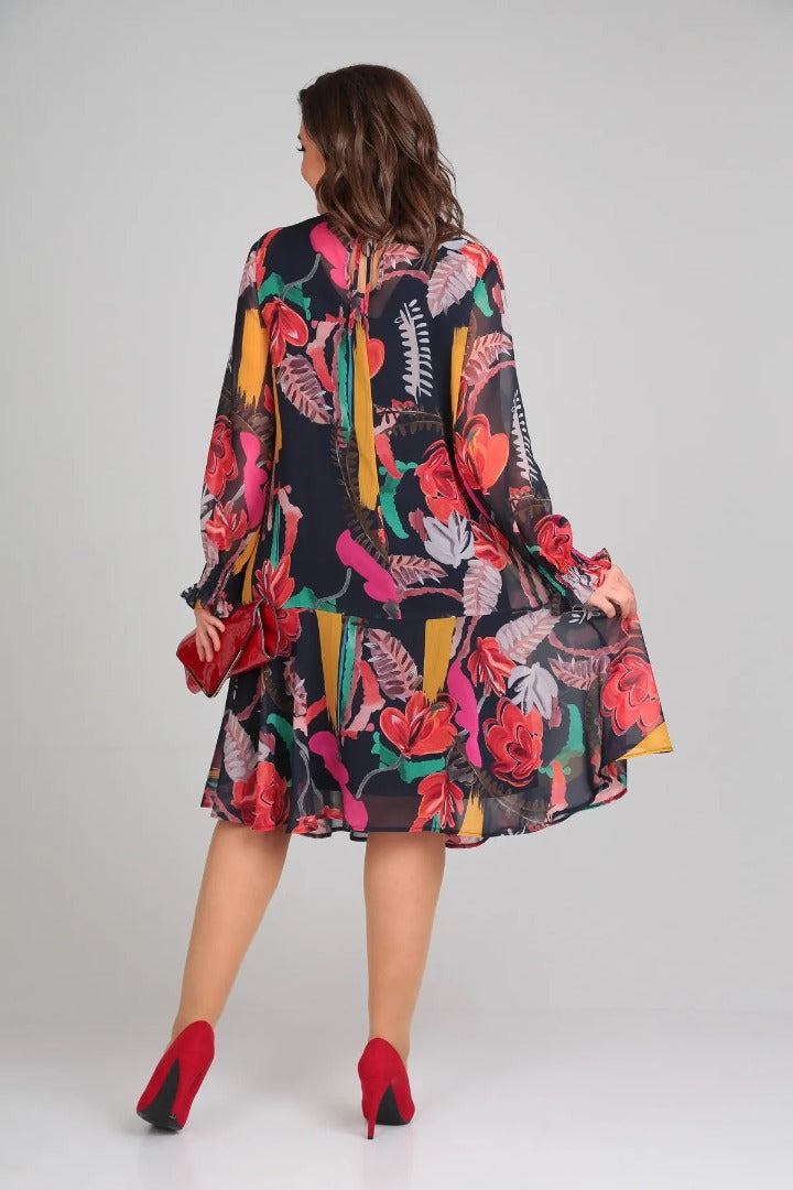 Florinda™ floral dress back view: dark navy with colorful floral print, flared skirt