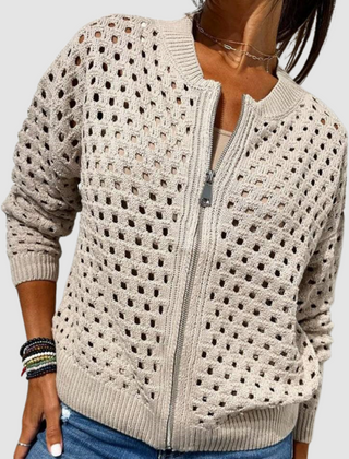 Beige knitted cardigan with full-zip front, perforated dot pattern, ribbed hem and cuffs