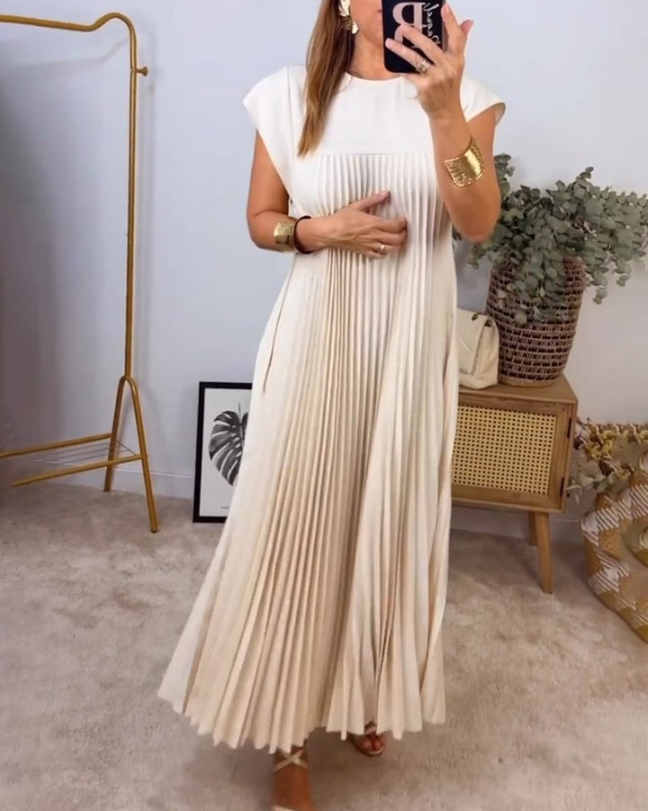 Pleated cream maxi dress with short sleeves and vertical pleat panels