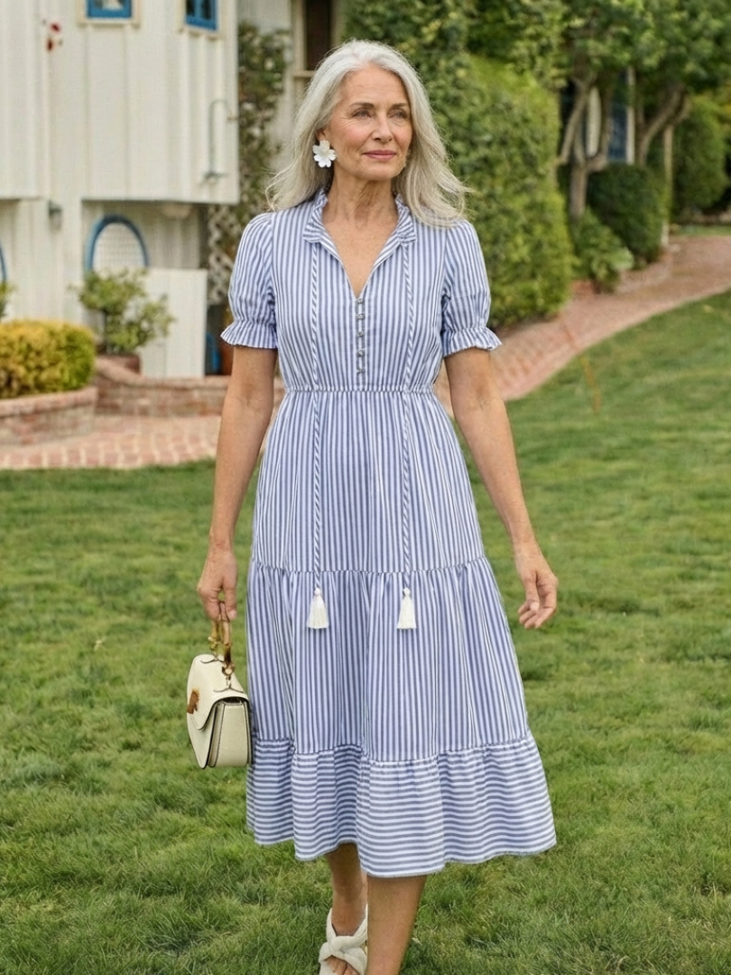 Sky blue striped tiered midi dress with puff sleeves, V-neck and tassel-trim tiers