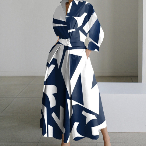 Navy and white abstract print shirt dress with long sleeves, collar, tie waist