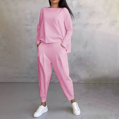 Pink two-piece lounge set with long-sleeve sweatshirt and tapered ankle jogger pants