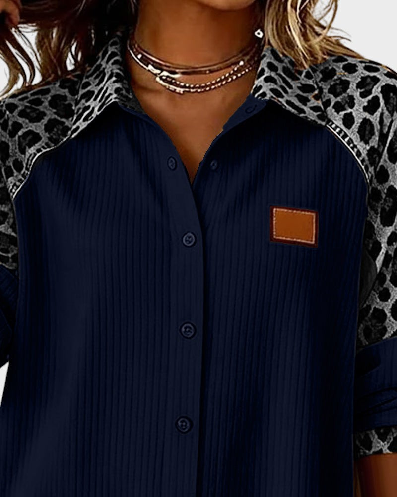Navy button-down shirt with leopard print trim and chest patch pocket