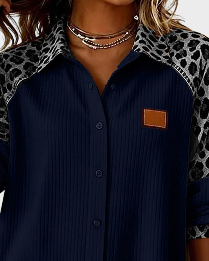 Navy button-down shirt with leopard print trim and chest patch pocket
