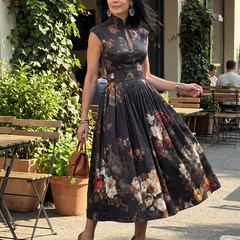 Black floral pleated midi dress with high-neck keyhole and full skirt