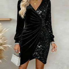 Black velvet sequin wrap mini dress with long sleeves and V-neck