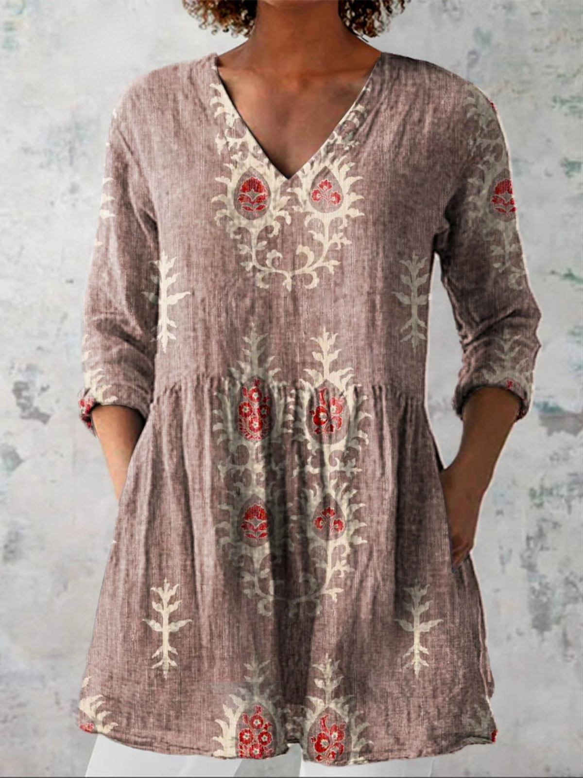 Rose long-sleeve V-neck embroidered blouse with gathered waist and folk floral motifs
