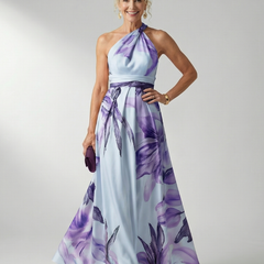 Light floral maxi dress with halter neck; lavender and purple blooms on pale blue