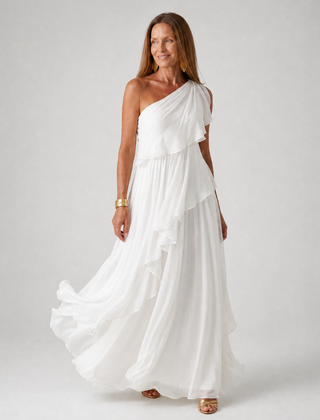 White one-shoulder maxi dress with layered ruffle tiers and flowing chiffon skirt