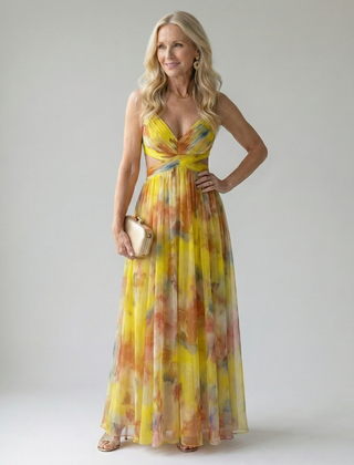 Soft wrap maxi dress with bright yellow and orange watercolor print, sleeveless V-neck